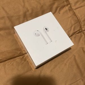 - NEW Apple AirPods with Charging Case. 2nd Generation. In original packaging